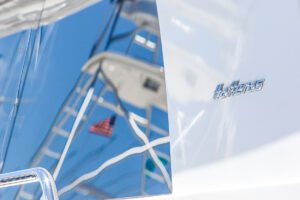 Reflection of another fishing boats tower in the window of a Hatteras fishing boat.