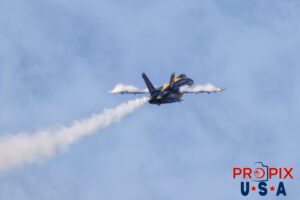 Climb out. Blue Angels F-18 performing at the 2025 Sun N Fun airshow in Lakeland Florida. As a climb is being initiated, a condensation cloud was forming on the aircraft. #6 Lieutenant Connor O'Donnell (opposing Solo) Aircraft code: F18 Airport code(s): KLAL, LAL
