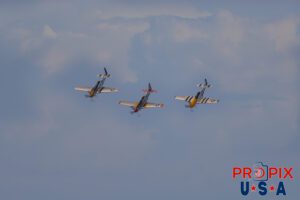 N51MX 1945 North American P-51 Mustang (Mad Max) N51LW 1962 North American P-51 Mustang (The Little Witch) N5444V 1944 North American P-51 Mustang (Miss Kandy) performing at dusk during the 2025 Sun N Fun airshow in Lakeland Florida. Aircraft code: P51 Airport code(s): KLAL, LAL