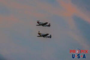 N51MX 1945 North American P-51 Mustang (Mad Max) N51LW 1962 North American P-51 Mustang (The Little Witch) Performing at dusk during the 2025 Sun N Fun airshow in Lakeland Florida. Aircraft code: P51 Airport code(s): KLAL, LAL