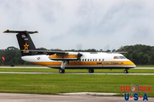 Golden Knights team plane. U.S. Army Golden Knights parachute team aircraft is rolling down the runway for takeoff at the 2025 Brunswick Georgia airshow. The aircraft is a modified deHavilland Twin Otter, with the military designation of C-147A Aircraft code: C147, DHC6 Airport code(s): BQK, KBQK Photo date: 5-17-2025