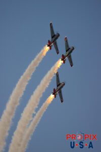 Titan Aerobatic team night performance at the 2025 Sun N Fun airshow in Lakeland Florida. #1 N791MH 1951 North American T-6 Texan. Mark Henley Team Lead #2 N3267G 1943 North American T-6 Texan. Bryan Regan Right Wing #3 N7462C 1958 North American T-6 Texan Steve Gustafson Left Wing Aircraft code: T6 Airport code(s): KLAL, LAL