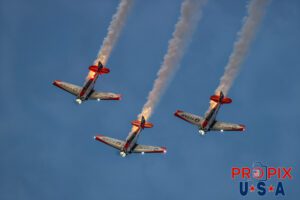 Titan Aerobatic team night performance at the 2025 Sun N Fun airshow in Lakeland Florida. #1 N791MH 1951 North American T-6 Texan. Mark Henley Team Lead #2 N3267G 1943 North American T-6 Texan. Bryan Regan Right Wing #3 N7462C 1958 North American T-6 Texan Steve Gustafson Left Wing Aircraft code: T6 Airport code(s): KLAL, LAL