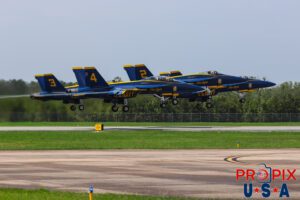 Off to the next adventure..! A DISAPPOINTING DEPARTURE..! Approximately an hour before this photo was taken at the 2025 Brunswick Georgia airshow, the organizers canceled the final performances (F-22 demo team and The Blue Angels) due to a brief rain shower. There were a lot of disappointed and upset people. Looking carefully into the #4 aircraft, you'll notice a lucky passenger who's videoing the departure on a phone. #1 Commander Adam Bryan (Commanding Officer) #2 Commander Jack Keilty (Right Wing) #3 Major Brandon Wilkins (Left Wing) #4 Lieutenant Commander Wes Perkins (Slot) Aircraft code: F18 Airport code(s): BQK, KBQK Photo date: 5-18-2025