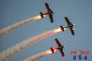 Titan Aerobatic team night performance at the 2025 Sun N Fun airshow in Lakeland Florida. #1 N791MH 1951 North American T-6 Texan. Mark Henley Team Lead #2 N3267G 1943 North American T-6 Texan. Bryan Regan Right Wing #3 N7462C 1958 North American T-6 Texan Steve Gustafson Left Wing Aircraft code: T6 Airport code(s): KLAL, LAL