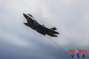 F-35 Performing a rapid climb. Condensation trails can be seen as well as hot exhaust gases being emited from the exhaust. This was a part of the 2025 Sun N Fun airshow in Lakeland Florida. Aircraft code: F35 Airport code(s): KLAL, LAL
