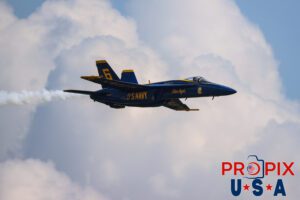 Set up for "Opposing horizontal rolls". Blue Angel #6 approaches show center where he will cross paths with solo #5 to perform "Opposing Horizontal Rolls" at the 2025 Augusta Georgia airshow. #6 Lieutenant Commander Connor O'Donnell (opposing Solo) Aircraft code: F18 Airport code(s): KAGS, AGS