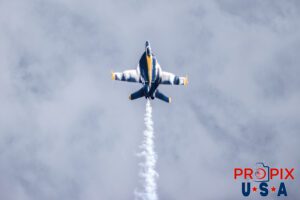 OL' SNEAKY PETE..! Coming from behind the spectator area at just above ground level, traveling at an ear ringing velocity near the speed of sound (around 690mph) Blue Angel #6 performs the "Sneak to Vertical Rolls" where he climbs almost instantly to 15,000' at the 2025 Augusta Georgia airshow. The ferocity and agressiveness of this maneuver is evidenced by the thickness of the vapor cloud forming around the aircraft. #6 Lieutenant Connor O'Donnell (opposing Solo) Aircraft code: F18 Airport code(s): KAGS, AGS