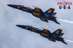 The Blue Angels solos are performing the maneuver called the "Section High Alpha Pass". This was part of the 2025 Augusta Georgia airshow. #5 Commander Thomas Zimmerman (Lead Solo) #6 Lieutenant Commander Connor O'Donnell (opposing Solo) Aircraft code: F18 Airport code(s): KAGS, AGS