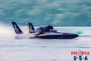 Unlimited hydroplane "Apollo" (Driven by Dave Villwock is seen competing at the 2024 Hydrofest at Lake Guntersville Alabama. This class of boat is powered by a 3,000+ horsepower turbine engine capable of propelling the boat to well over 200 MPH.