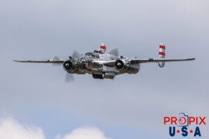 How to level the playing field... Literately..! N9079Z 1944 North American B-25 Bomber "Panchito" is making a low altitude pass with it bomb bay doors open at the 2025 Sun N Fun airshow in Lakeland Florida. The aircraft was being commanded by Captain Don Seiler. Aircraft code: B25 Airport Code(s): KLAL, LAL