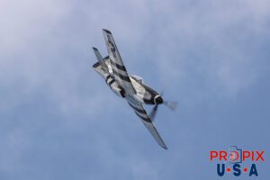 What a beautiful whistling sound the machine gun barrels make. N51HY a 1944 North American P-51 Mustang called Quick Silver was performing a high speed low altitude pass with Scott "Scooter" Yoak at controls during the 2025 Sun N Fun airshow in Lakeland Florida. Aircraft code: P51 Airport Code(s): KLAL, LAL