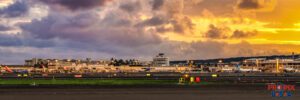 Honolulu airport at sunrise. Honolulu International Airport bathing in warm tropical sunlight as another beautiful Hawaiian Morning is getting underway.