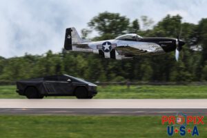 Gotta go..! N51HY 1944 P-51 Mustang racing a Tesla truck at the 2025 Augusta Georgia airshow. Aircraft code: P51 Airport code(s): KAGS, AGS