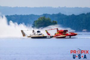 APBA Unlimited Hydroplanes #1 and #40 are racing at Lake Guntersville Alabama in the 2024 Hydrofest. The #1 boat "Beacon Electric" was driven by J. Michael Kelly. The #91 boat "Miss Goodman Real Estate" was driven by Andrew Tate. The unlimited hydroplanes are powered by 3,000+ hp tirbine engines and are capable of running at over 200 mph.
