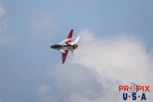 F-16's version of The Roaring Twenties..! F-16 Falcon Demonstrator Aircraft, piloted by Major Taylor "FEMA" Hiester performing a high speed knife edge banking turn with afterburner engaged. The everpresent exhaust gases and the forming of contrails visible near the wings fuselage attachment points in addition to the right hand missle attachment point are indicative of the agressiveness and ferocity of this maneuver. This was part of the performance at the 2025 Sun N Fun airshow in Lakeland Florida. Aircraft code: F16 Airport Code(s): KLAL, LAL