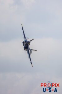 Fly by the bank..! Blue Angels #5 Commander Thomas Zimmerman (Lead Solo) doing a high speed banking pass at the 2025 Sun N Fun airshow in Lakeland Florida. Aircraft code: F18 Airport code(s): KLAL, LAL