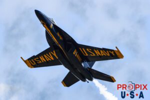 Blue Angel #6 performing the slow speed portion of the "Section High Alpha Pass". Aircraft #5 is also performing same maneuver, but not seen in this image. #6 Lieutenant Commander Connor O'Donnell (opposing Solo) Aircraft code: F18 Airport code(s): KAGS, AGS