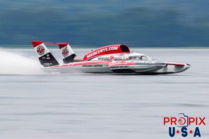 APBA Unlimited Hydroplane #11 "Miss Mercury's Coffee" (Driven by Jamie Nilsen) is racing on Lake Guntersville Alabama in the 2024 Hydrofest. The unlimited hydroplanes are powered by 3,000+ hp turbine engines and are capable of running at over 200 mph.