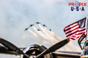 Generations of National pride..! The old, the new and Old Glory. In the foreground is a 1944 B-26 Bomber "Million Airess" displaying the American flag. The Blue Angels are performin the "Head on Delta Breakout" as they approach the crowd at the 2025 Sun N Fun airshow in Lakeland Florida. Tail Number: N26BP Aircraft codes: B26, F18 Airport Code(s): KLAL, LAL