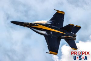 Screw Six Flags..! Blue Angels #4 Lieutenant Commander Wes Perkins (Slot) is seen here performing a high speed banking turn with afterburners activated while performing at the 2025 Sun N Fun airshow in Lakeland Florida. Aircraft code: F18 Airport code(s): KLAL, LAL