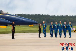 Walking to work..! Blue Angels pilots in formation to board their aircraft at the 2025 Brunswick Georgia airshow. #1 Commander Adam Bryan (Commanding Officer) #2 Commander Jack Keilty (Right Wing) #3 Major Brandon Wilkins (Left Wing) #4 Lieutenant Commander Wes Perkins (Slot) #5 Commander Thomas Zimmerman (Lead Solo) #6 Lieutenant Commander Connor O'Donnell (opposing Solo) Aircraft code: C147, DHC6 Airport code(s): BQK, KBQK Photo date: 5-17-2025