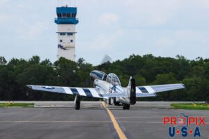 Owning Quick silver will surely give you a quick wallet cleaning. P-51 Mustang "Quick Silver" was awaiting clearance to taxi to the end of the runway to start it's amazing performance of this historic warbird. The aircraft was being piloted by Scott "Scooter" Yoak. Scooter's performances in this beautiful aircraft never disappoint, as his piloting skills are truly exceptional. Tail number: N51HY Aircraft code: P51 Airport code(s): KLAL, LAL