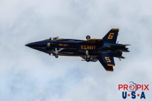 Mirror mirror on the wall.... Blue Angels #5 and #6 are performing the maneuver called "FORTUS". As the two aircraft approach show center, both flying "dirty" (landing gear and tailhooks extended), aircraft #5 rolls to become inverted. Aircraft #6 which awaits the inversion then slides alongside for an exceptional photo opportunity for the crowd, as the two aircraft appear nearly as one. This was part of the performance at the 2025 Sun N Fun airshow in Lakeland Florida. Aircraft code: F18 Airport code(s): KLAL, LAL