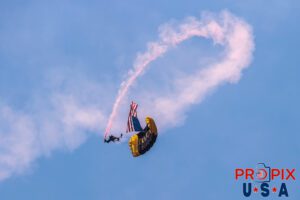 Para Commandos parachute team delivering the American flag to the opening ceremony of the 2025 Augusta Georgia airshow. Airport code(s): KAGS, AGS