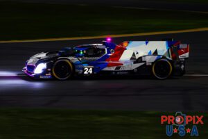 NOT a leased 3 series..! A Beautiful and extremely crisp image of the #24 BMW GTP car accelerating at a tremendous rate upon exiting the International Horseshoe in the pre dawn hours of the 2025 Rolex 24 at Daytona.