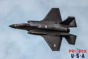 I'll circle on back to ya on that..! F-35 demonstrator was performing an afterburner turn at the 2025 Sun N Fun airshow in Lakeland Florida. The clarity of the image not only shows great aircraft detail, but the pilot is clearly seen, (although through a color tinted canopy). Aircraft code: F35 Airport Code(s): KLAL, LAL