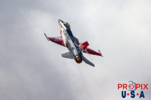 Pizza in 30 minutes or less, or it's FREEEEEE..! F-16 Falcon Demonstrator Aircraft, piloted by Major Taylor "FEMA" Hiester is seen here performing a high speed climb with afterburner engaged. This demonstration was at the 2025 Sun N Fun airshow in Lakeland Florida. Aircraft code: F16