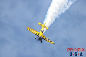 Rolling up a good smoke..! Mike Goulian is performing in his 2008 Extra EA-300 at the 2025 Sun N Fun airshow in Lakeland Florida. Tail Number: N821MG Aircraft code: E300 Airport code(s): KLAL, LAL