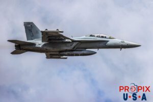 Hold on tight... it might get a little bumpy..! This extremely clear and up close image is of a demonstration flight of a F-18 at the 2025 Sun N Fun airshow in Lakeland Florida. If you look at the passenger in the back seat, they appear to be holding onto a handle for dear life.... still..! Aircraft code: F18 Airport code(s): KLAL, LAL
