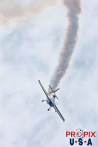 Courage: Pointing your aircraft towards the ground while accelerating. N821MG 2009 Extra EA-300 piloted by Mike Gulian at the 2025 Brunswick Georgia airshow. Aircraft code: E300 Airport code(s): BQK, KBQK Photo date: 5-17-2025