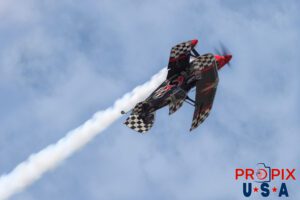 Sneaking by.. Skip Stewart performs an inverted / rolling pass in his 2011 Pitts S-2 aircraft at the Sun N Fun airshow in Lakeland Florida. Aircraft code: PTS2 Airport code(s): KLAL, LAL