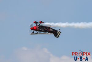 Skip Stewart performs an inverted pass in his 2011 Pitts S-2 aircraft at the Sun N Fun airshow in Lakeland Florida. Aircraft code: PTS2 Airport code(s): KLAL, LAL