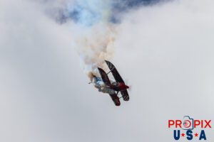 NOT a smoke free flight..! Skip Stewart performs a stall in his 2011 Pitts S-2 aircraft at the Sun N Fun airshow in Lakeland Florida. Aircraft code: PTS2 Airport code(s): KLAL, LAL