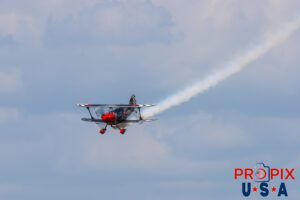 A little smoke is normal..! Skip Stewart performs a large loop in his 2011 Pitts S-2 aircraft at the Sun N Fun airshow in Lakeland Florida. Aircraft code: PTS2 Airport code(s): KLAL, LAL