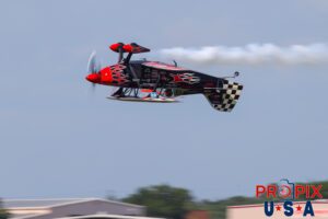 Showin off..! Skip Stewart performs a low altitude inverted pass in his 2011 Pitts S-2 aircraft at the Sun N Fun airshow in Lakeland Florida. Aircraft code: PTS2 Airport code(s): KLAL, LAL