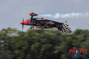 Airshow is simply flyin by.. !Skip Stewart performs a low altitude inverted pass in his 2011 Pitts S-2 aircraft at the Sun N Fun airshow in Lakeland Florida. Aircraft code: PTS2 Airport code(s): KLAL, LAL