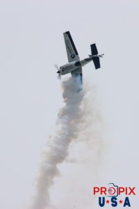 Mike Goulian doing a little side slide. N821MG 2009 Extra EA-300 piloted by Mike Gulian at the 2025 Brunswick Georgia airshow. Aircraft code: E300 Airport code(s): BQK, KBQK Photo date: 5-17-2025