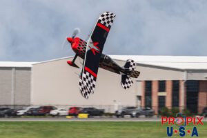 Just leave the door cracked..! Skip Stewart performs a super low altitude knife edge pass in his 2011 Pitts S-2 aircraft at the Sun N Fun airshow in Lakeland Florida. Aircraft code: PTS2 Airport code(s): KLAL, LAL