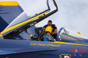 Pre show prep and laughs. Blue Angels preparing for the 2025 show in Brunswick Georgia. Navy petty officer Jerry Fain is talking with opposing solo LCDR Connor O'Donnell prior to their demonstration. #6 Lieutenant Commander Connor O'Donnell (opposing Solo) Aircraft code: F18 Airport code(s): BQK, KBQK Photo Date: 5-17-2025