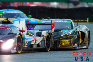 Just a friendly little rub..! Howdy neighbor..! A group of slower cars in front of the BMW GTP precipitated a traffic jam in the morning hours of the 2025 Rolex 24.