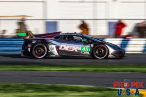 A beautiful photo of the #45 Lamborghini GTD as it was approaching the International Horseshoe in the morning hours of the 2025 Rolex 24 at Daytona.