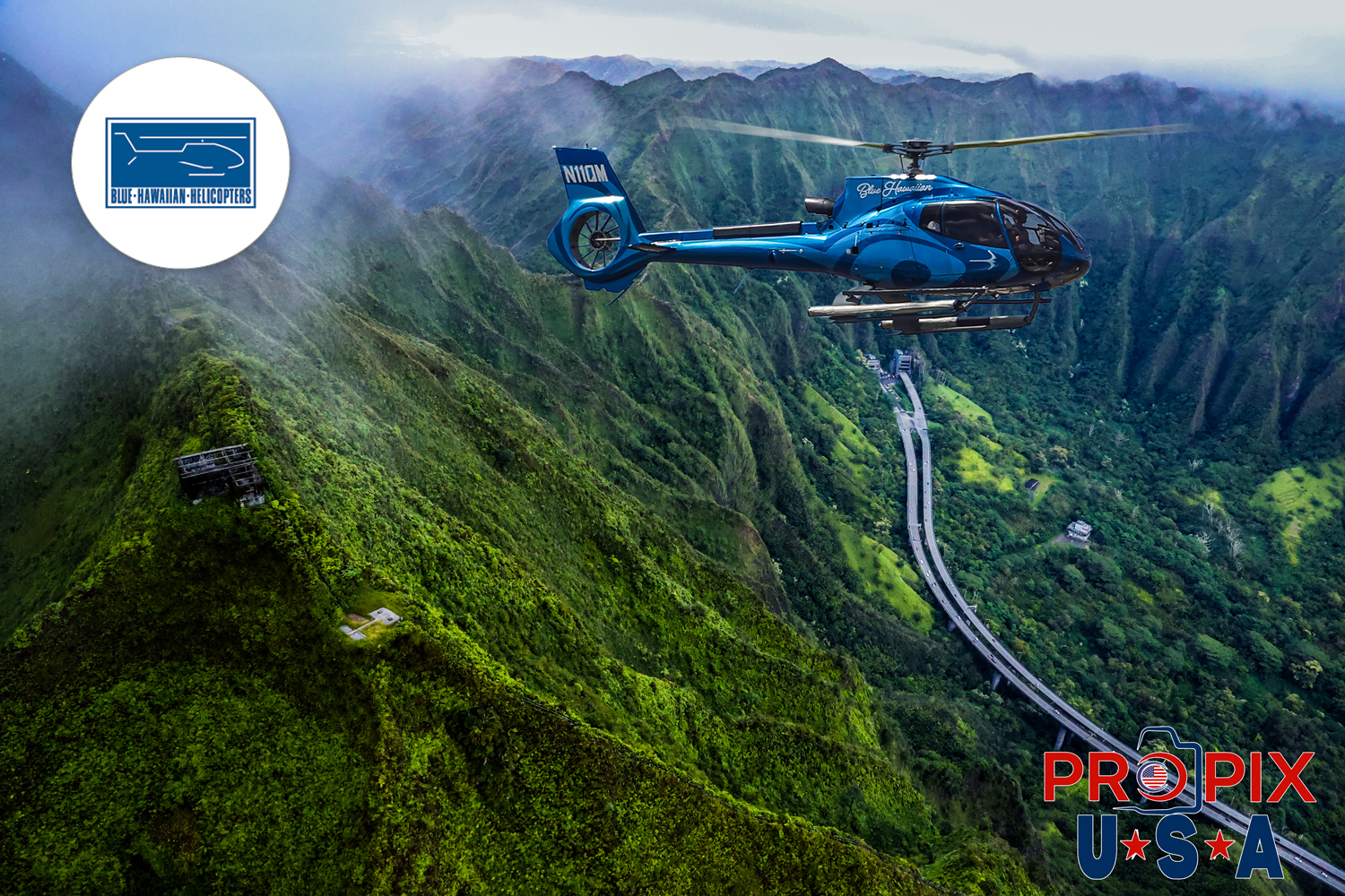 Blue Hawaiian helicopters (N11QM) is seen passing a U.S. Navy WW II radio station atop the Ko'olau mountains. The "Stairway To Heaven" is the popular name for the Haiku stairs near Kaneohe, Oahu Hawaii. The top isn't often seen as there are usually clouds around the peaks of the mountains. There are a set of stairs that people still do occasionally climb, although doing so is illegal and relatively harsh penalties are often times handed out, after a mandatory visit to the Honolulu County "Hilton". Within five minutes of flying past the summit in our helicopters, the cloud cover had enveloped the top of the mountains.