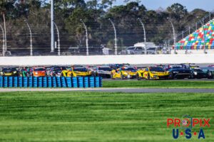 Racing to church on Sunday morning..? I doubt it..! A restart as seen at turn one in the morning hours of Sunday at the 2025 Rolex 24 at Daytona. It's evident from the formation of the cars and clear aggressiveness that while the clock is ticking, the fight is definitely still on.