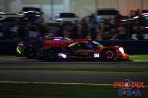 People like this are the reason to not buy used rental cars..! As the GTD Lamborghini and the LMP2 car approached the International Horseshoe with excess fuel being expeled from the prototype along with red hot brakes showing the ferocity and intensity the 24 hours at Daytona musters. This was taken during the early evening hours of the 2024 event.