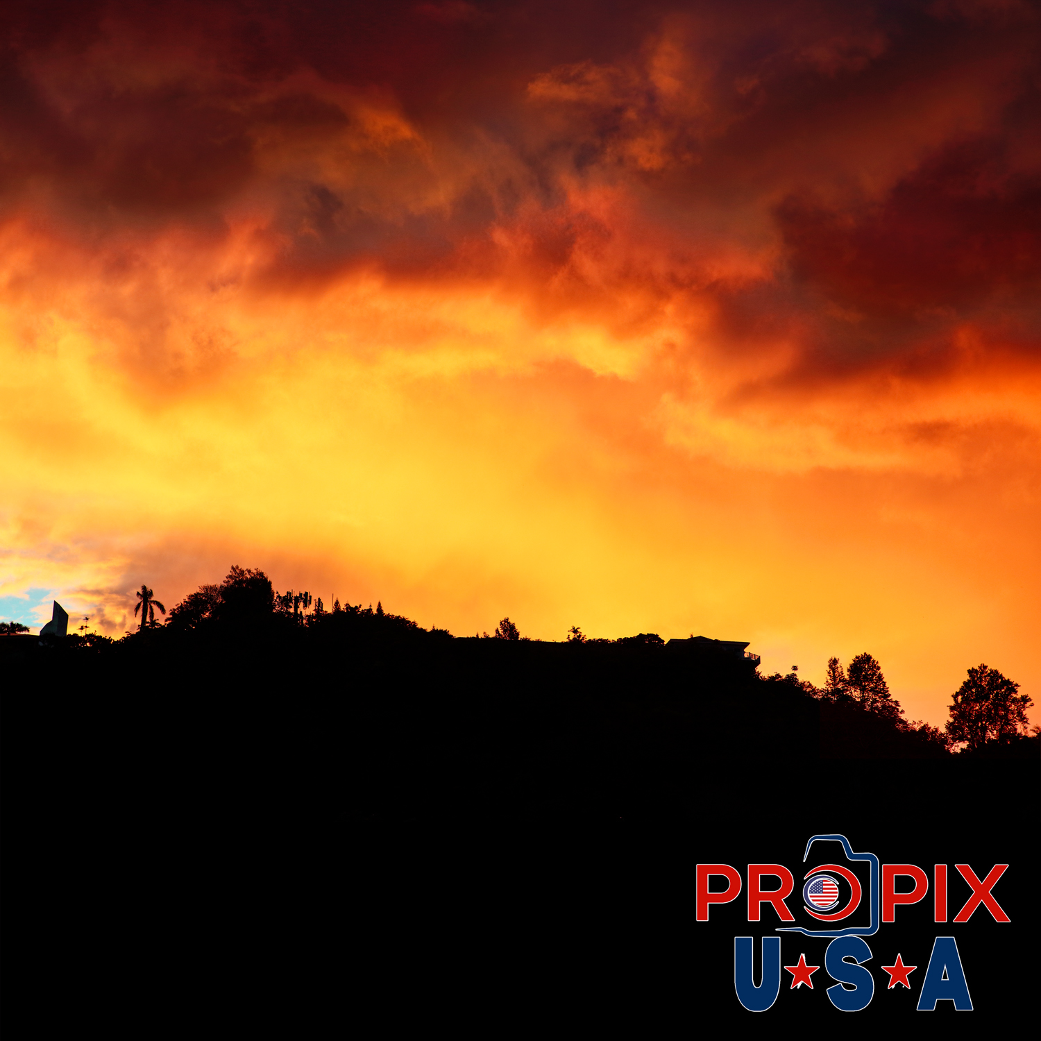 Fire in the sky. Houses on the bluff overlooking PuPukea beach park on Oahu's north shore are no strangers to spectacular sunrises.